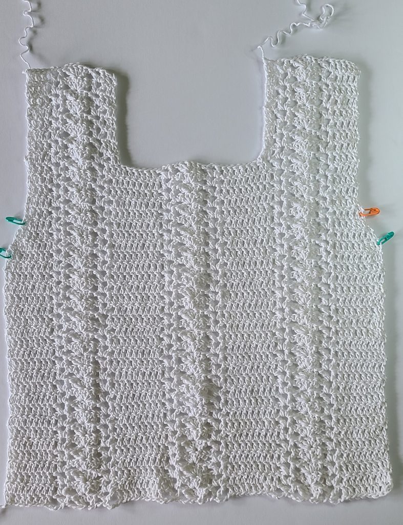 Front panel of the Sabina Crochet Lace Top showing the lace stitch pattern