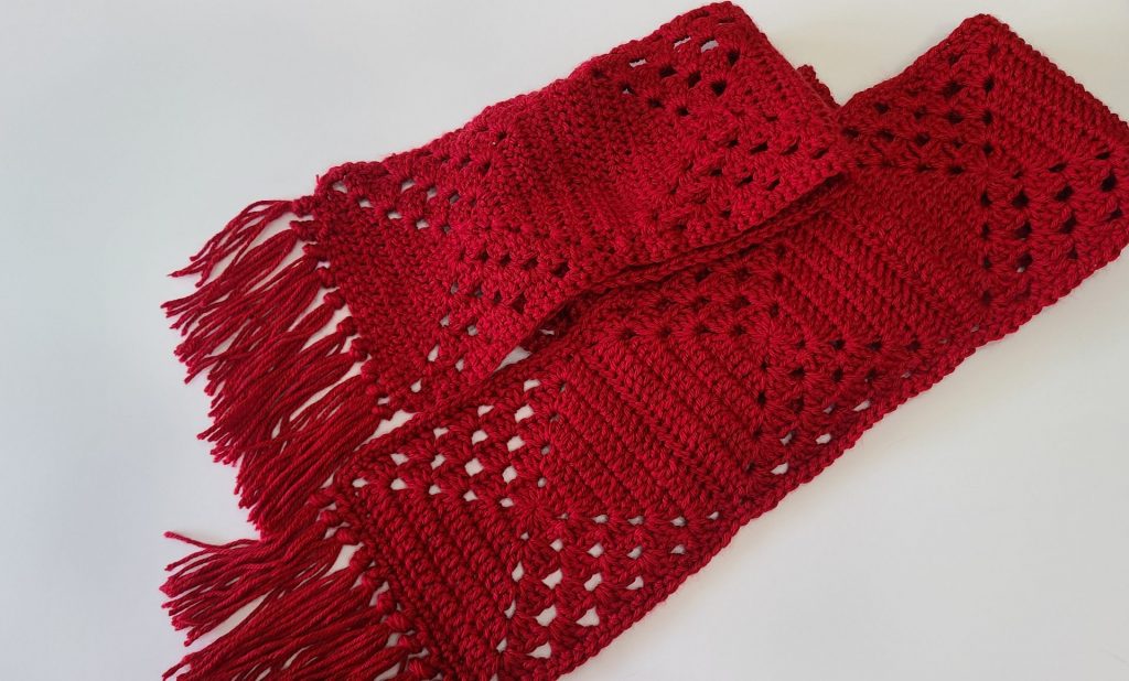 crochet granny square scarf on a white background