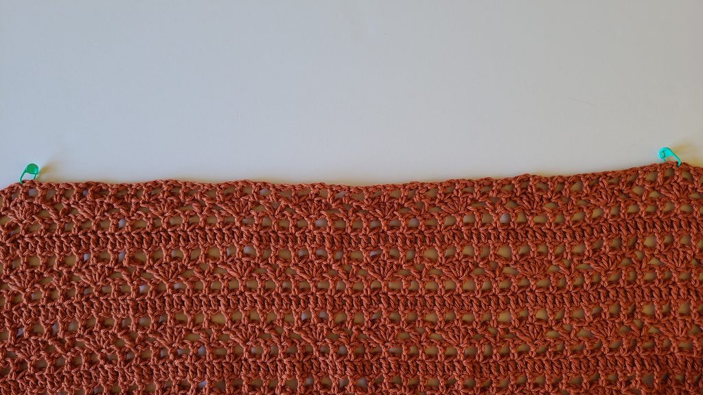 Crochet main panel for the Lamelya Crochet Lacy Top showing the openwork lace stitch pattern and rectangular shape before assembly.