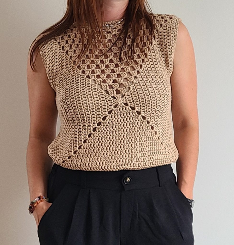 Light brown crochet granny square top for women, perfect summer outfit on white background.