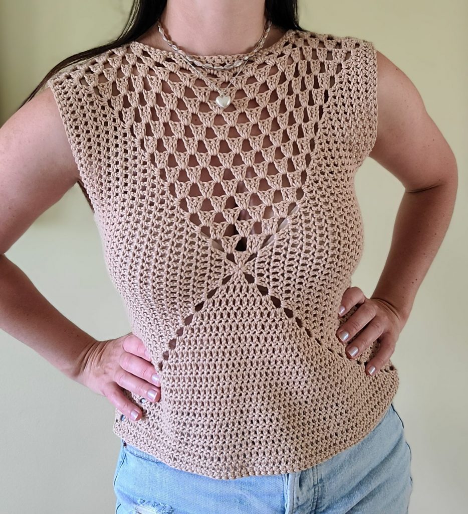 Casual chic light brown crochet granny square top worn by a woman on a white background, 