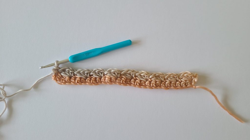 Full view of Row 2 of the Amalya Crochet Scarf showing complete stitch pattern and texture