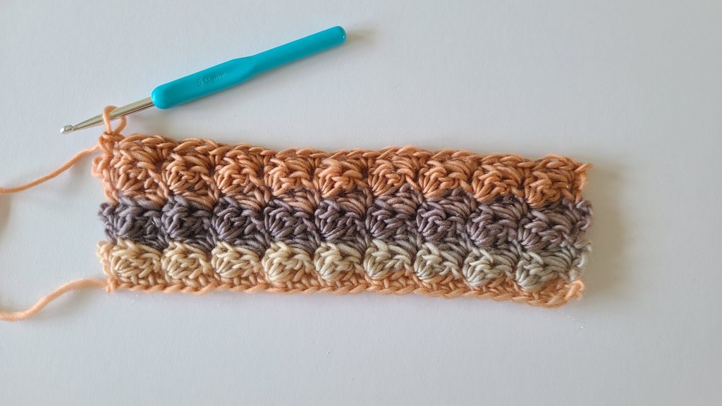 Close-up of the first six rows of the Amalya Crochet Scarf showing stitch pattern and texture development