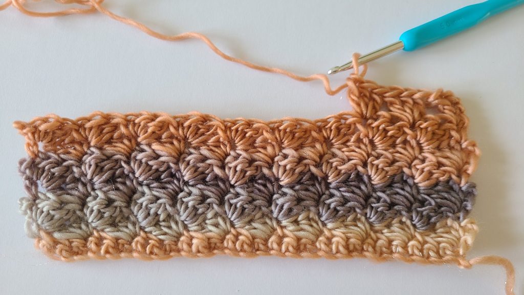 Starting stitches of Row 8 in the Amalya Crochet Scarf showing textured stitch pattern