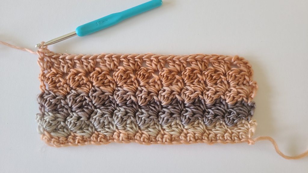 Row 8 of the Amalya Crochet Scarf fully displayed showing textured crochet pattern