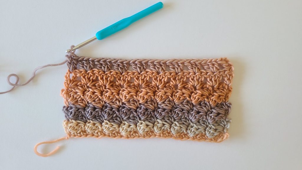 Detailed view of Row 9 on the Amalya Crochet Scarf showing stitch alignment