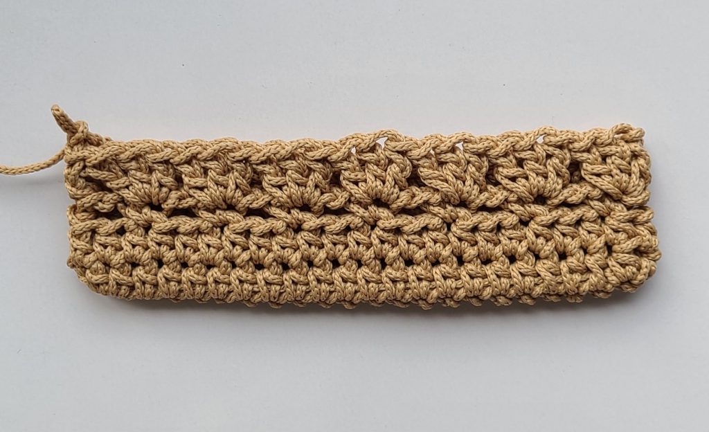 “Fourth row of the crochet crossbody bag base fully completed”