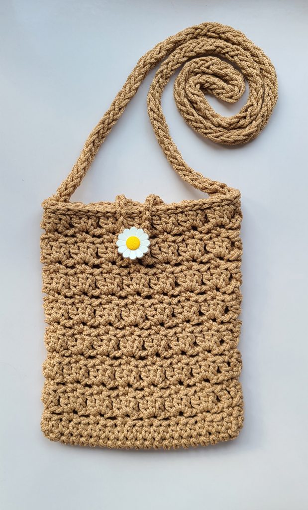 “Finished crochet crossbody bag angled view”