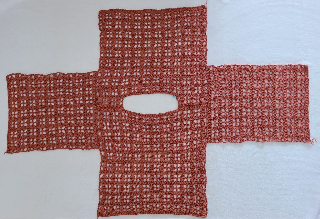 Assembling the front, back, and sleeves of the Galena crochet lacy top