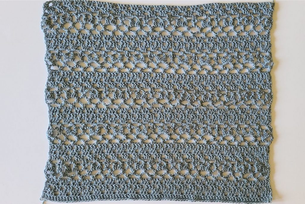 crochet lace top back panel with airy stitch pattern laid flat