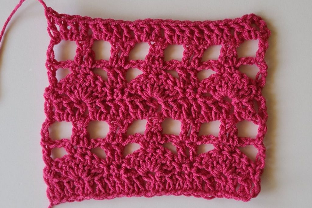“Gauge swatch for the Myla crochet lace crop top showing stitch pattern and tension sample”