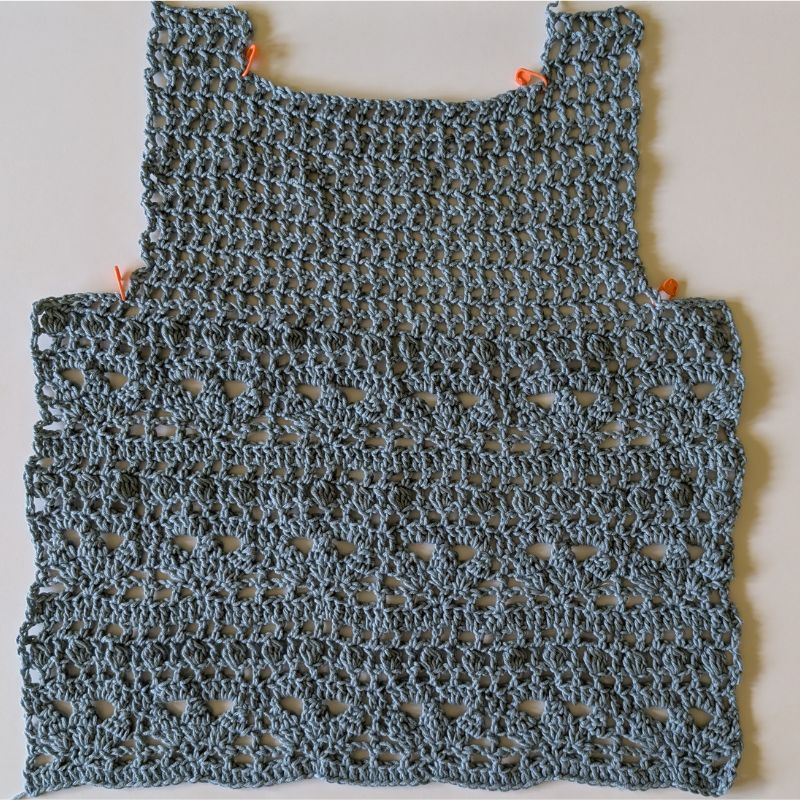 Front panel of the Allana Crochet Lace Top with neckline shaping completed before assembly.