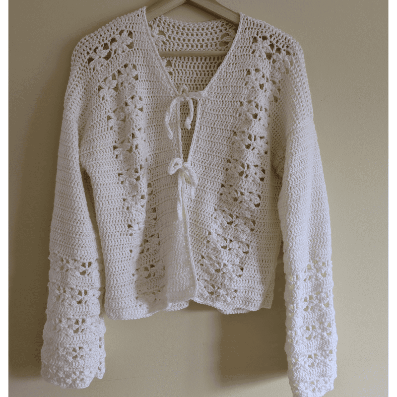 Finished Aryna Crochet Cardigan with lace details, long sleeves, and front ties