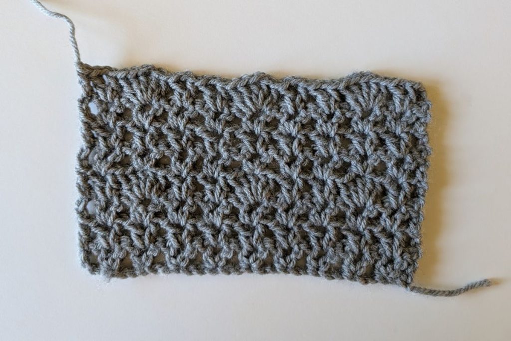 Gray crochet gauge swatch for the Zarina sweater vest pattern
